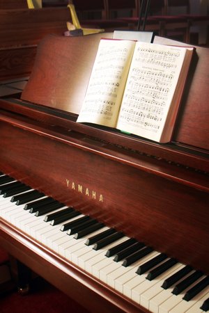 piano with hymn book